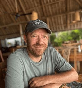 Justin sitting in the sunlight